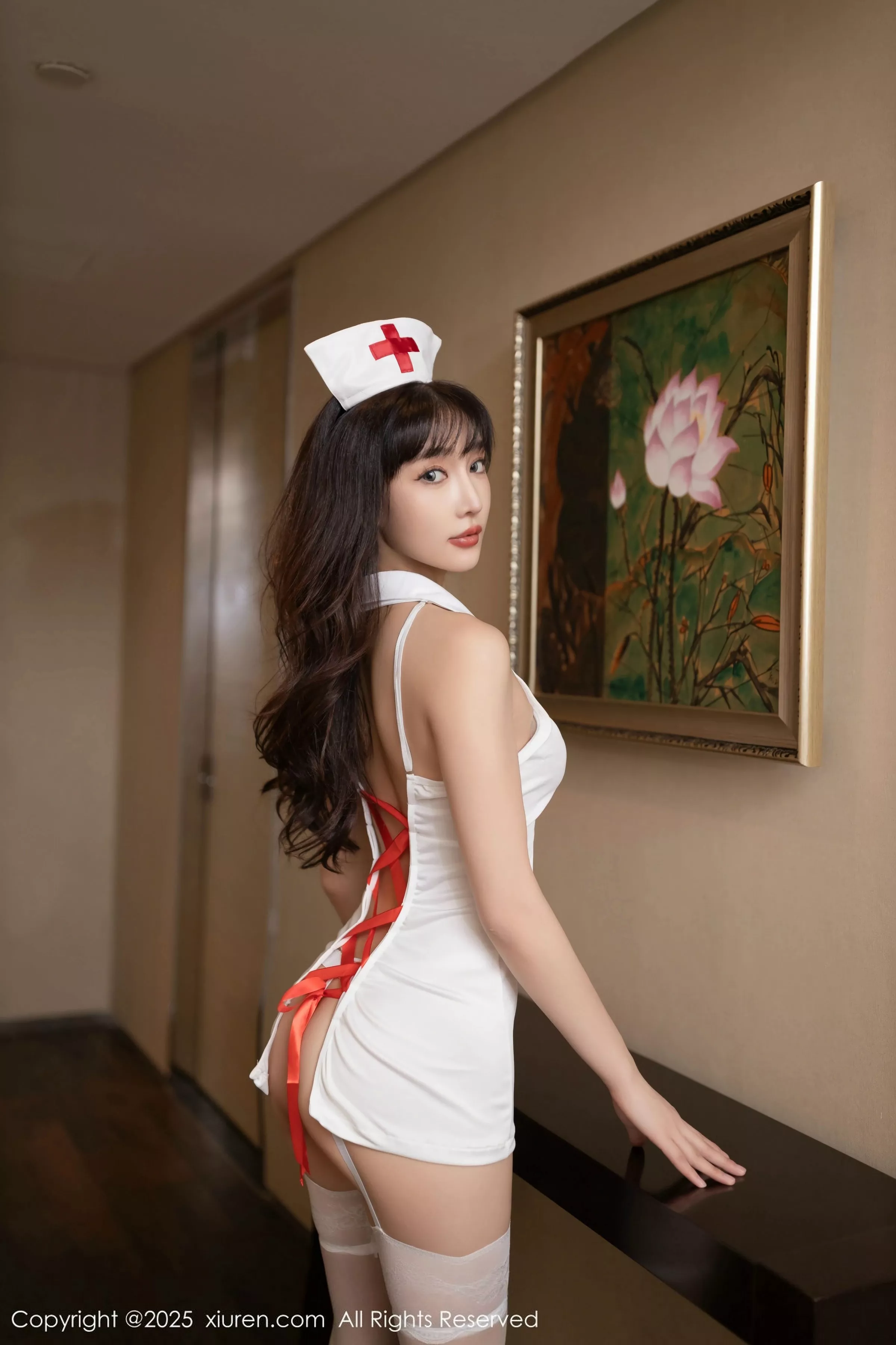 陆萱萱  [XiuRen]高清写真图 2025.05.08 No.10252 陆萱萱 白色丝袜第6张图片